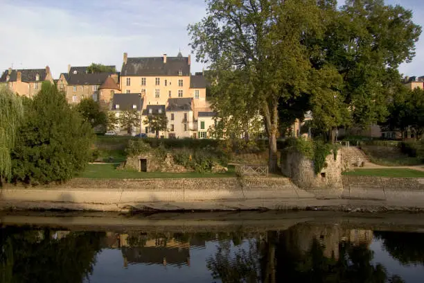 Europe, France, Loire Valley, Sarthe 72, Le Mans, River Sarthe, buildings of the old town line the river in evening sun