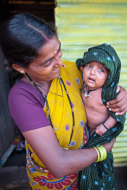 istock Indian woman with her baby 182669759