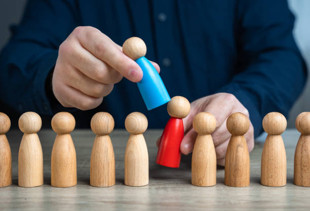 istock Replacing an unreliable person with a new subordinate. Installing a subservient leader, easily influenced, and serves the interests of others Manipulation of a particular agenda. 1826706339