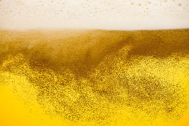 istock Closeup to Fresh Beer With Foam and Bubbles 182670713