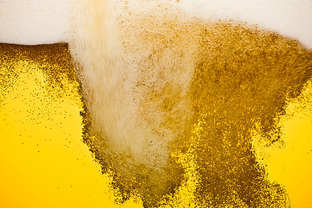 istock Closeup to Draft Beer With Foam and Bubbles 182670725