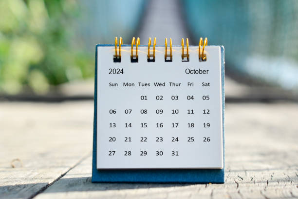 istock October 2024 white calendar with green blurred background. New year concept. 1826707430