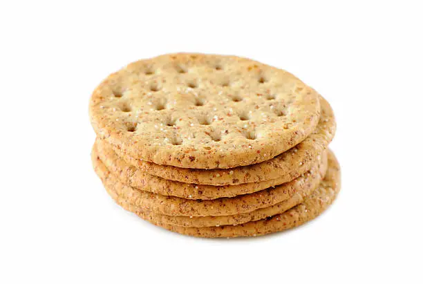 Photo of A pile of six crackers stacked on top of each other 