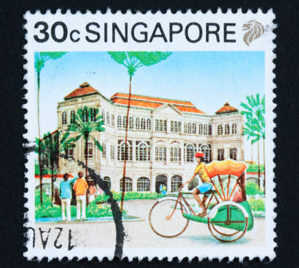 Colonial building (Raffles Hotel built in 1887) on stamp from Singapore.