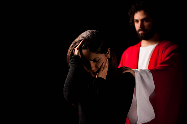 istock Stressed young woman with Jesus behind her 182671309
