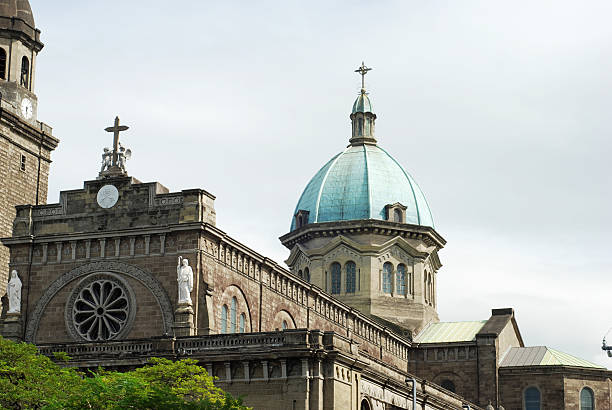 собор манила, филиппины - manila cathedral стоковые фото и изображения