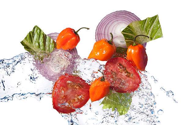 istock Fresh Tossed Salad Ingredients; Peppers,Tomatoes, Onion, lettuce, Water 182671781