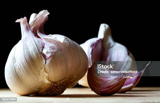 Garlic Stock Photo - Download Image Now - Cutting Board, Food, Food and Drink