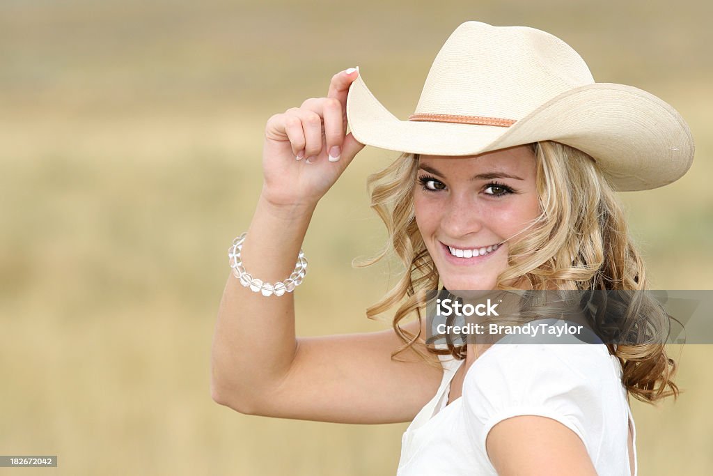 Bella Cowgirl - Foto stock royalty-free di Cappello da cowboy