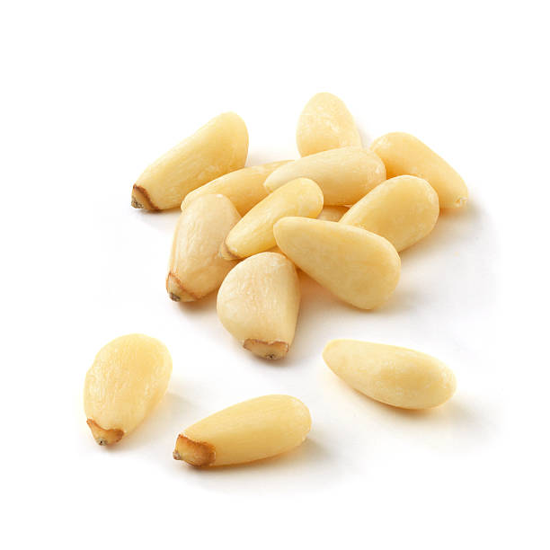 pinoli isolato - pine nut immagine foto e immagini stock