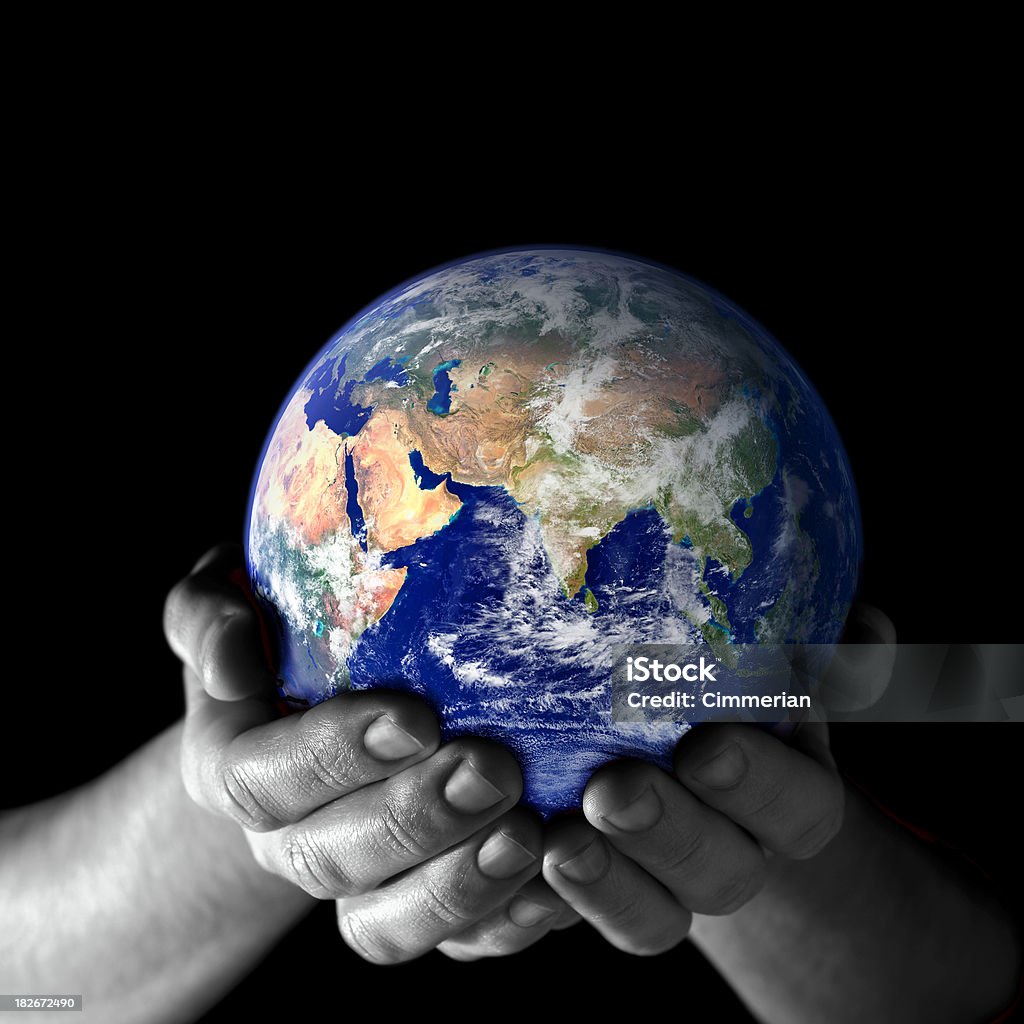 Terra nella mia mano-est vista - Foto stock royalty-free di Globo terrestre
