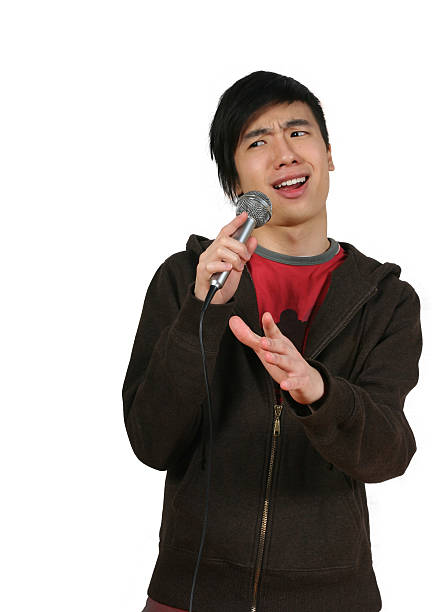 istock Standup Comic Male With Microphone 182672495