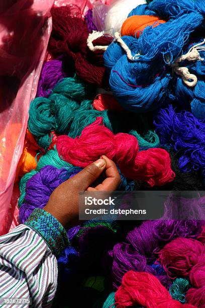 Hand With Skeins Of Brightly Colored Yarn Stock Photo - Download Image Now - Abstract, Art And Craft, Beauty