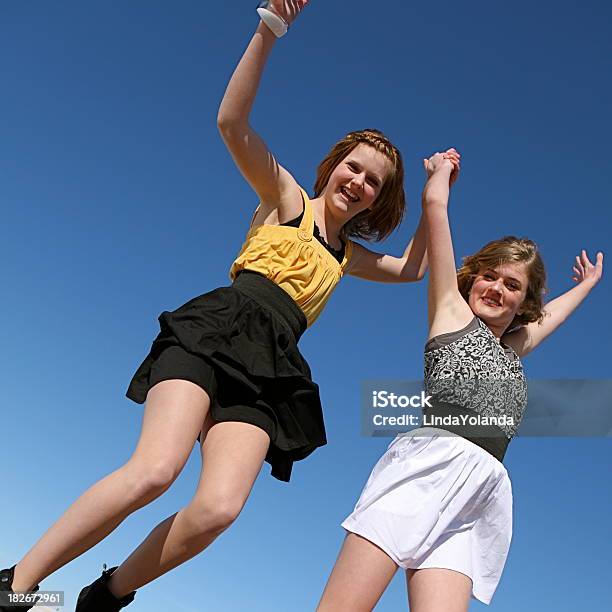 Teen Girls Jumping For Joy Stock Photo - Download Image Now - 12-13 Years, 14-15 Years, Activity