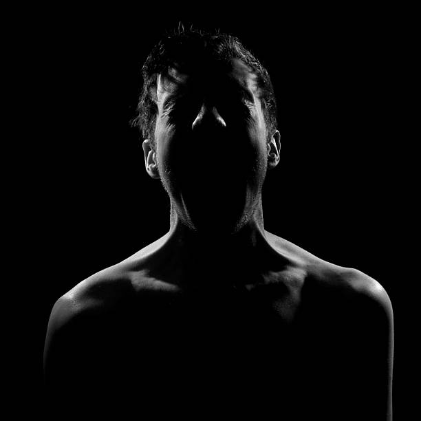 istock Man dramatic screaming in low light photoshoot 182673089