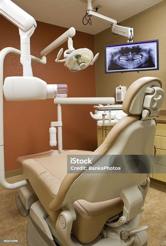 Nowoczesnych gabinetach dentystycznych z fotelem & RTG - Zbiór zdjęć royalty-free (Aparat RTG)