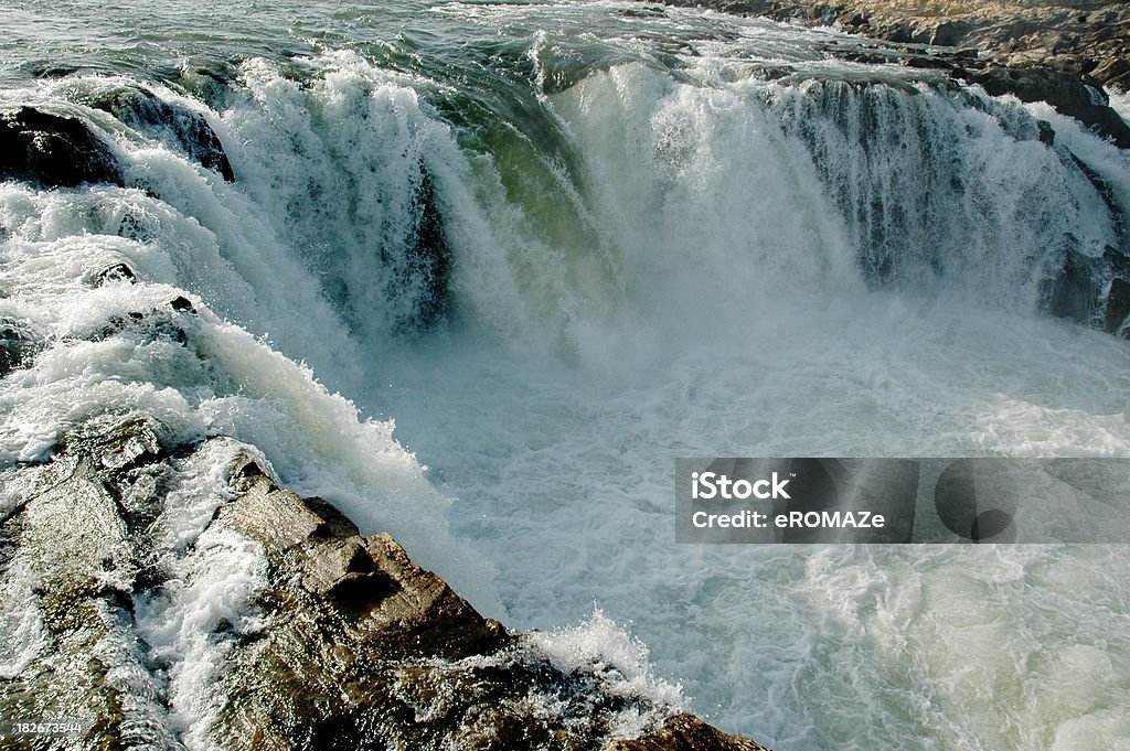 Waterfall "A spectacular waterfall over marble rocks in the watercourse of Narmada river at Jabalpur, India" Gurgling Stock Photo