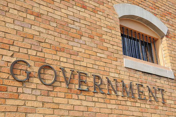 istock Government sign with barred window 182673777