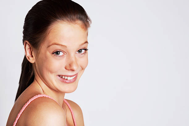 istock Cute smiling female isolated against white 182673959