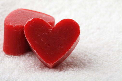 Red Heart Shaped Soap Bars on Towel