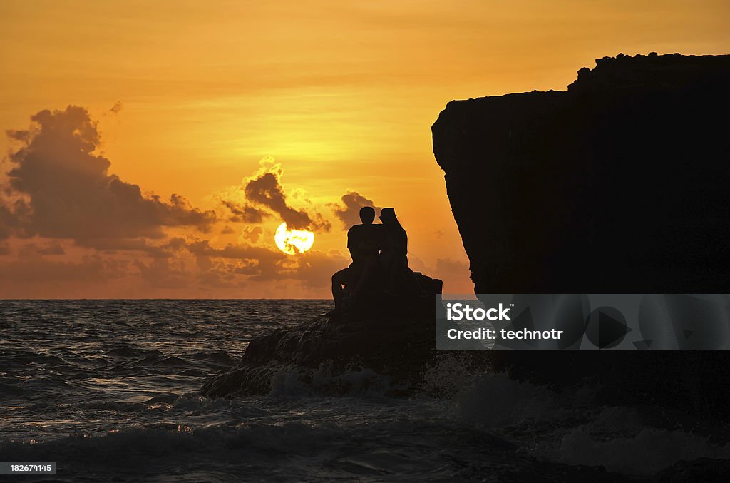 Romance en puesta de sol - Foto de stock de Isla libre de derechos