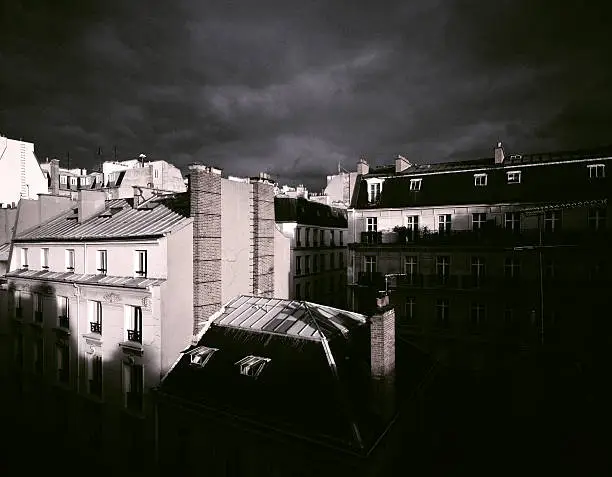 Ominous dark clouds gathering overhead. Birds-eye view of 'Rue de la Rochefoucauld'. High-end scan of 6x7cm transparency. Medium filmgrain is visible in higher resolution files.View more related images in one of the following lightboxes: