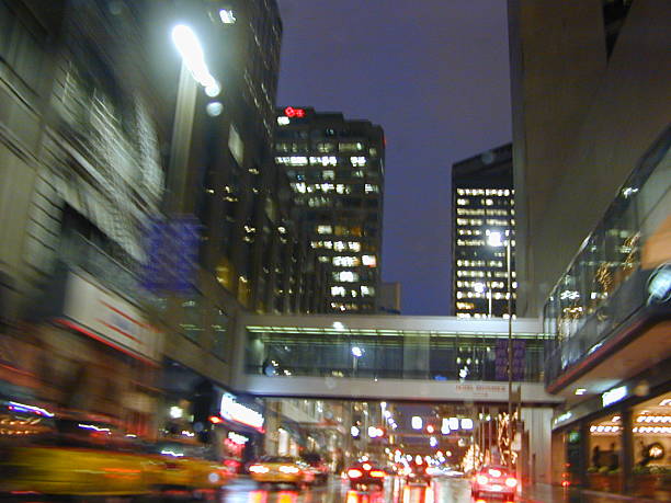 istock City street at night 182674667