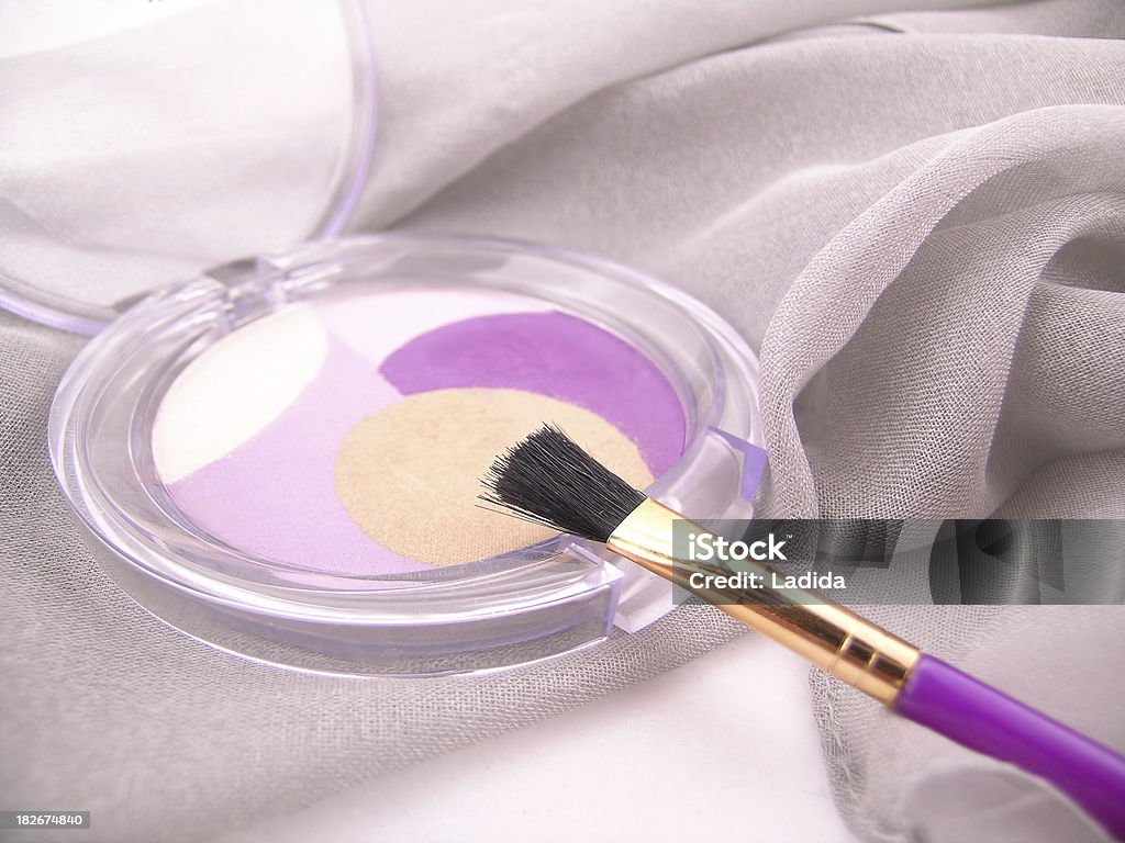 Brush & eye shadows "Cosmetics series. Make up brush & eye shadows. (shallow DOF, focus on brush)cosmetics lightbox:" Beauty Stock Photo