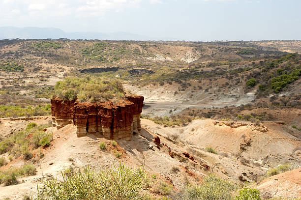 Olduvai Gorge 2 "Olduvai Gorge is an archaeological site located in the eastern Serengeti Plains, which is in northern Tanzania. Some of the oldest examples of man have been found in this ancient gorge." barron gorge national park stock pictures, royalty-free photos & images