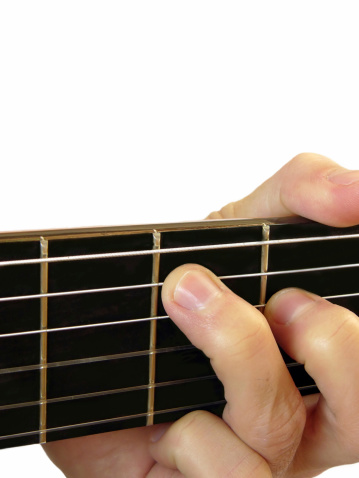 Hand playing guitar