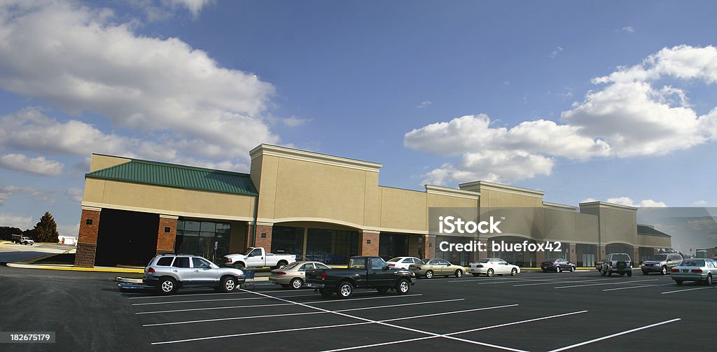 Strip mall A strip mall under blue sky.More Photos! Click Below Outdoors Stock Photo