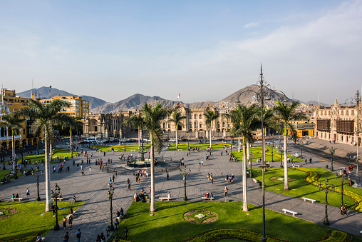 Lima Peru Plaza de Armas with government palace, seat of the president and historic water fountain