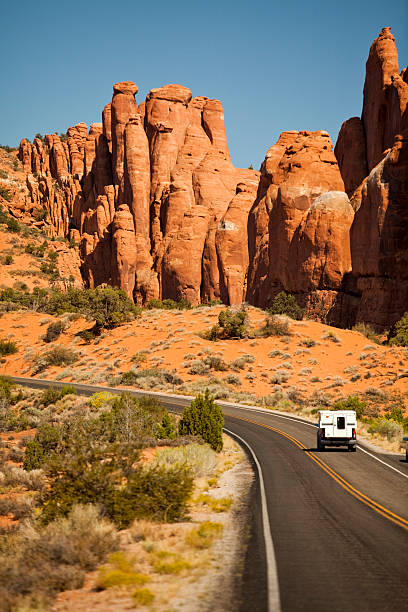 istock RV drives in the canyon 182675353