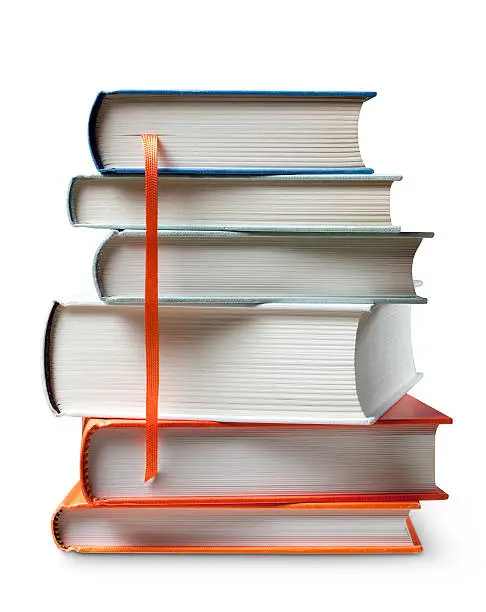 Stack of books with bookmark. 