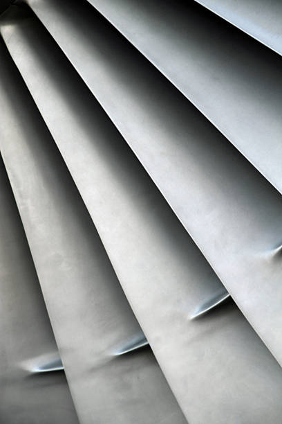 Hanging Blades The steel blades of a jet engine. jet intake stock pictures, royalty-free photos & images