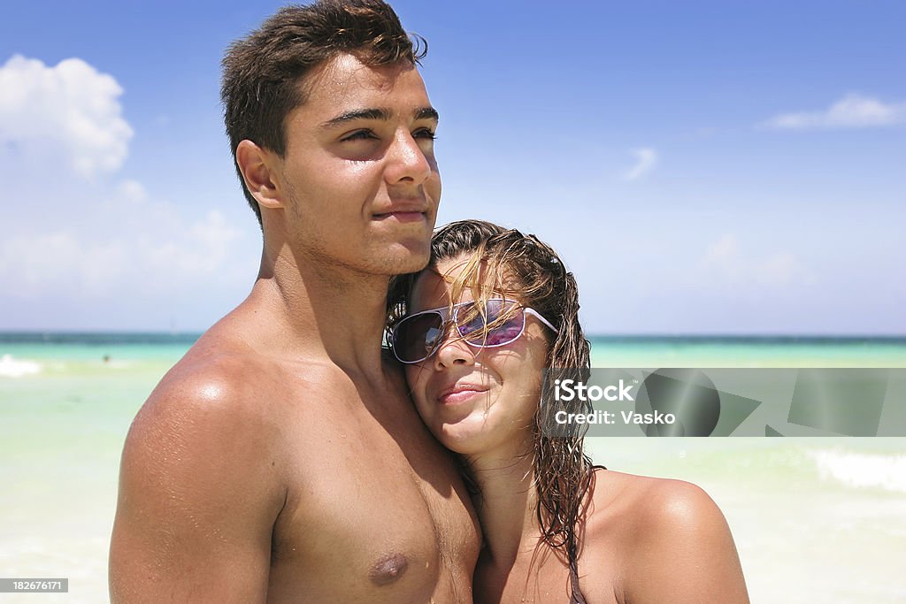 Couple at the beach picture of a couple at the beach. Bikini Stock Photo