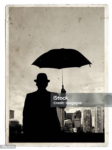 Man With Umbrealla On An Old Paper Stock Photo - Download Image Now - Umbrella, Men, Bowler Hat