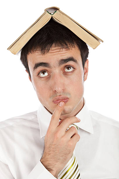 istock Young Businessman Searching an Answer 182676400