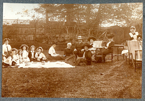 Edwardian Picnic Vintage photograph of a group of edwardians having a picnic. Circ 1900 to 1910. edwardian style photos stock pictures, royalty-free photos & images