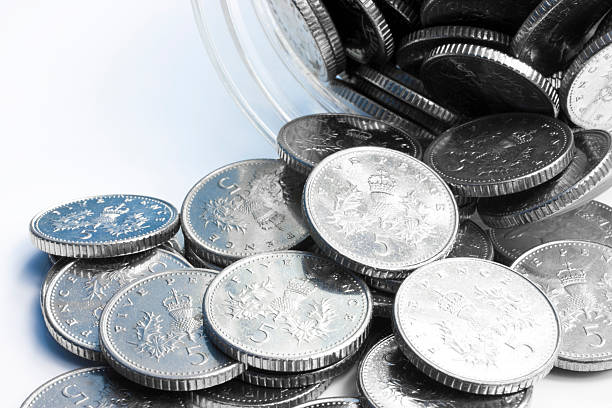 istock Spilled Jar of Coins 182677101