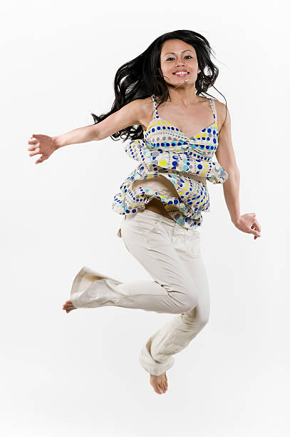 istock Filipina Woman Jumping 182677190