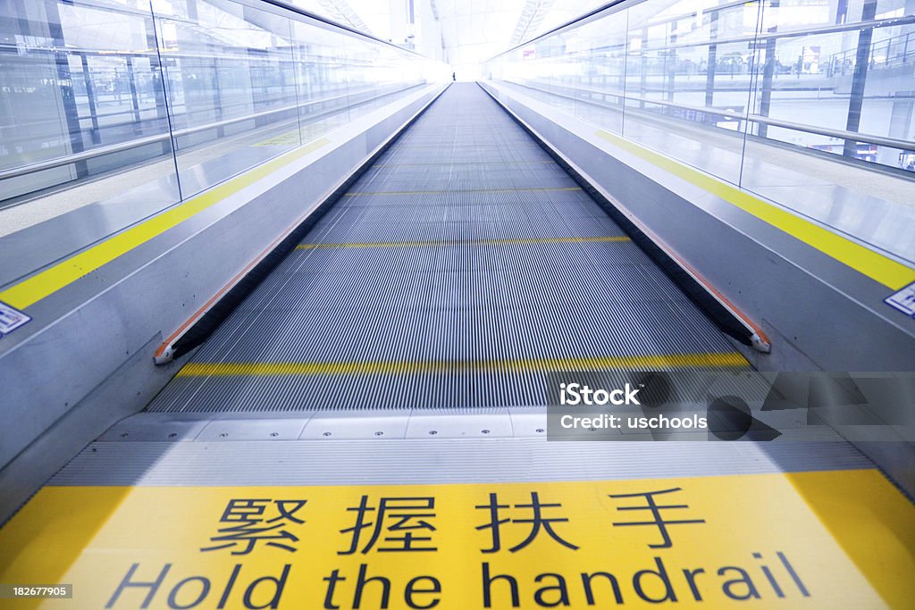 Rollender Bürgersteig: Halte den Handlauf - Lizenzfrei China Stock-Foto