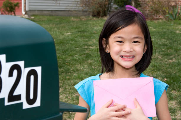 istock Little girl excited about mail 182678170