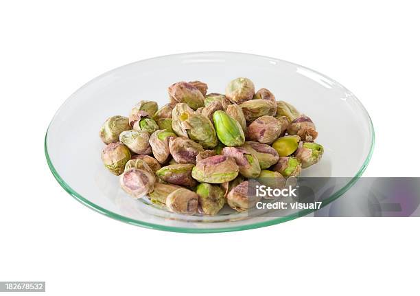 Pistachios Snack In A Glass Bowl Stock Photo - Download Image Now - Bowl, Pistachio, White Color