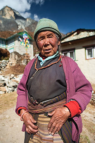 istock Nepali woman with rosary 182678567
