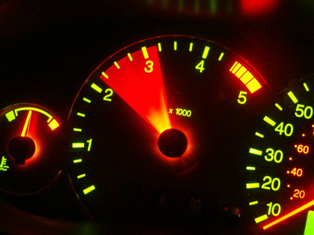 Revving up (2) Illuminated car dashboard with the rev counter in action. Revving stock pictures, royalty-free photos & images