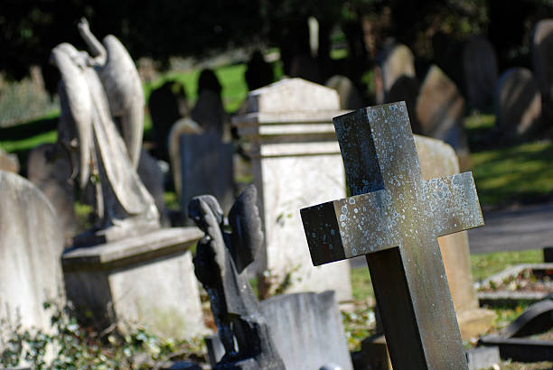 istock Cemetery tombstones 182680212