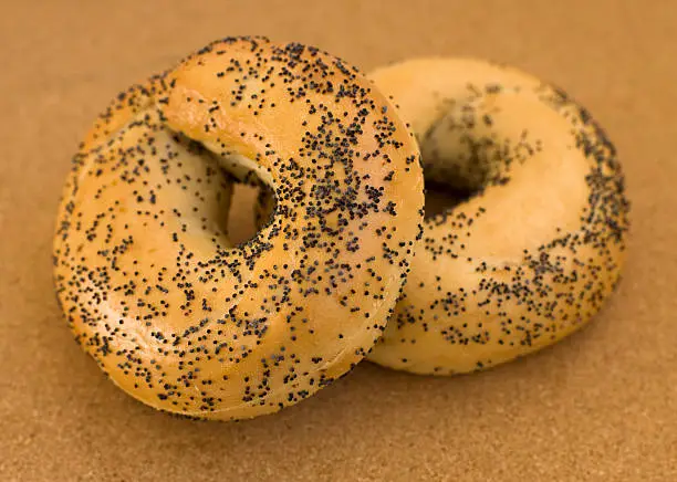 Two poppy seed bagels-------------------------------------------------Related image: