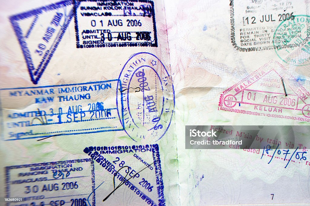 Passport Visa stamps "Visa Stamps In A Passport (Stamps Include Myanmar, Malaysia, Thailand)" Asia Stock Photo
