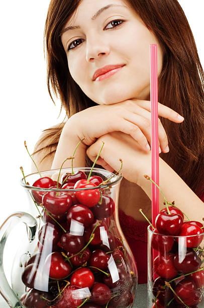 Lovely healthy woman with cherries